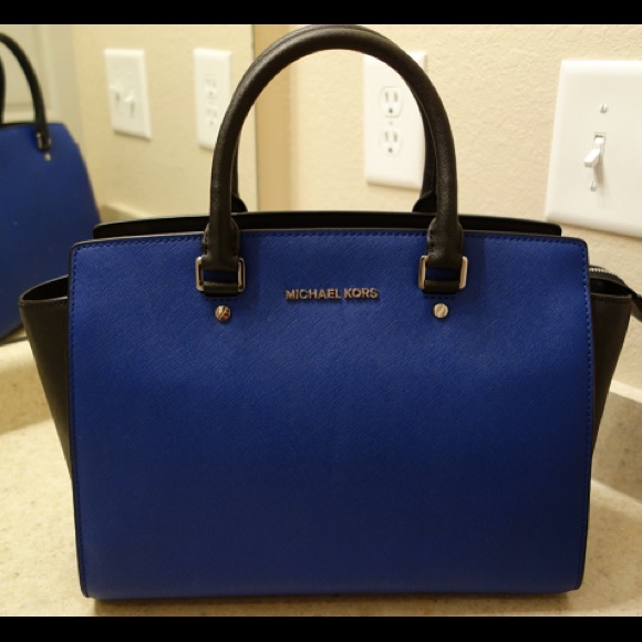 blue and black michael kors purse